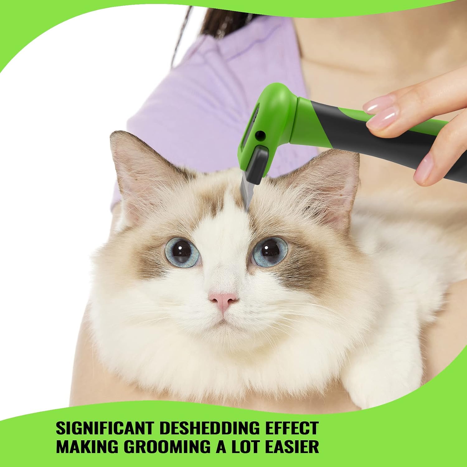 Pet grooming brush held in hand for demonstration