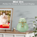 SOITIS ceramic dog and cat ashes keepsake placed on a living room shelf display