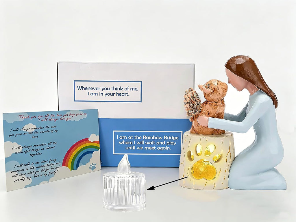 Angel cat remembrance decor displayed on a wooden bedroom nightstand