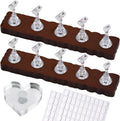 Esuohym nail stand front view showing walnut wooden base and magnetic holders.