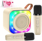 MicQutr mini karaoke machine for kids front view showing cream colored speaker and dual wireless microphones