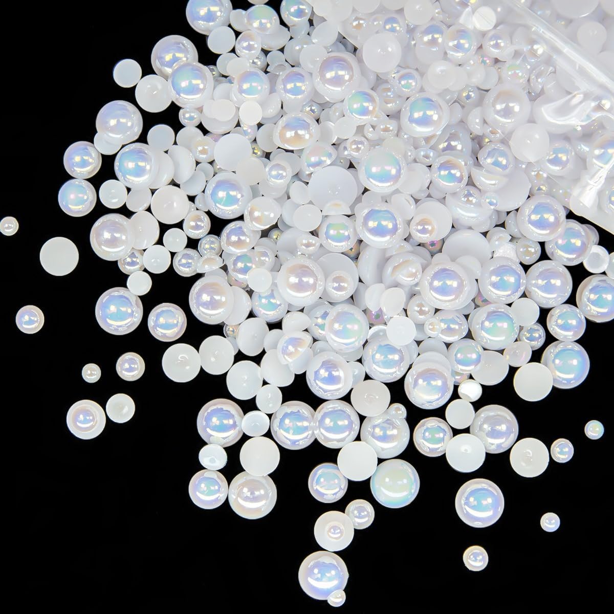 Qiipii white AB half round pearls in mixed sizes spread out