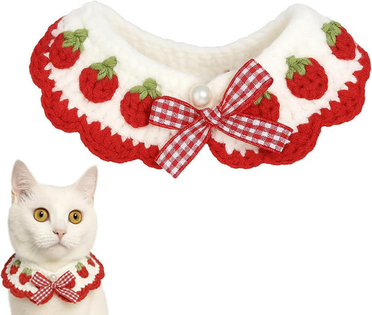Aoeeki breakaway cat collar front view featuring white handmade crochet strap and red strawberry knit charms.