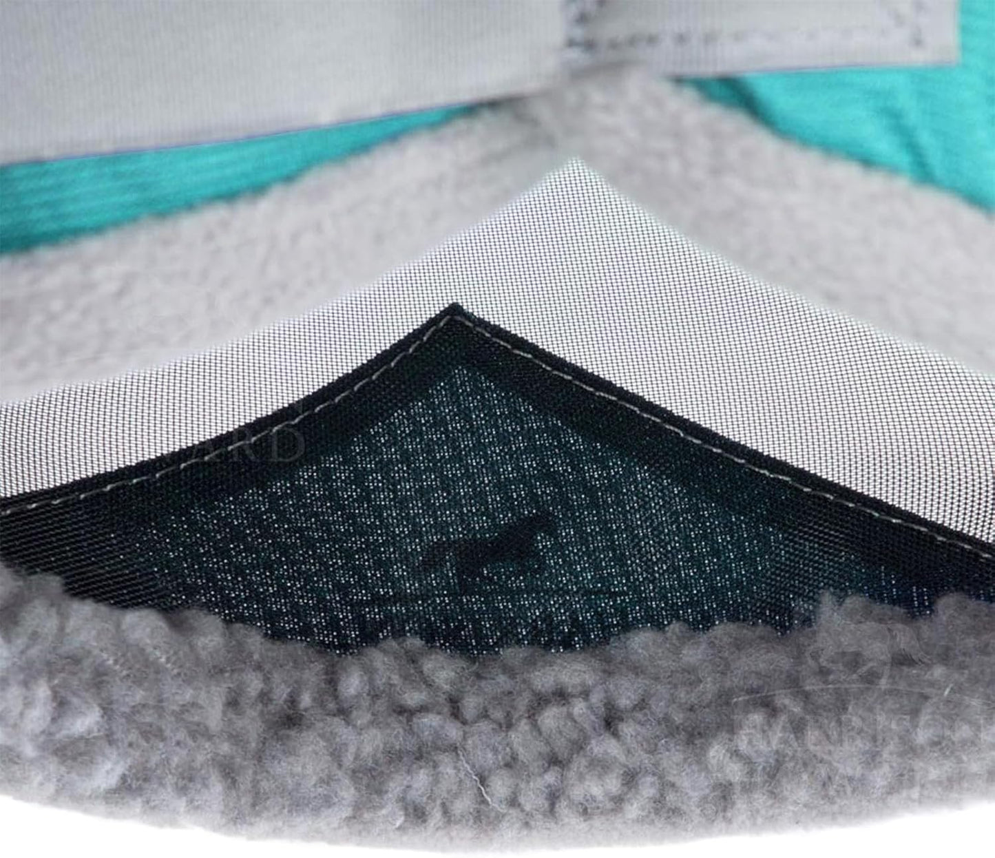 Harrison Howard fly mask closure mechanism and stitching detail
