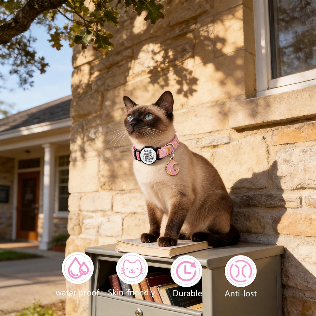 Close-up of the durable nylon fabric texture and jingle bell attachment on the pink kitten collar.