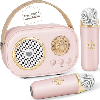 PRUNUS C20 Mini Karaoke Machine front view showing pink retro speaker and dual wireless microphones