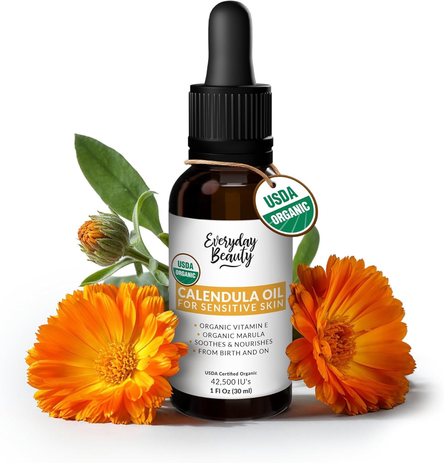 Everyday Beauty Organic Calendula Oil front view showing the amber glass bottle and dropper packaging.