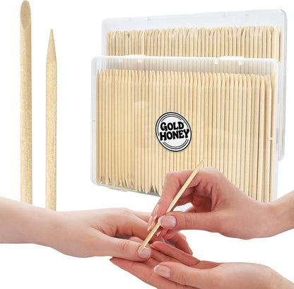 Bcowos Gold Honey wooden cuticle pusher sticks front view in clear storage case.
