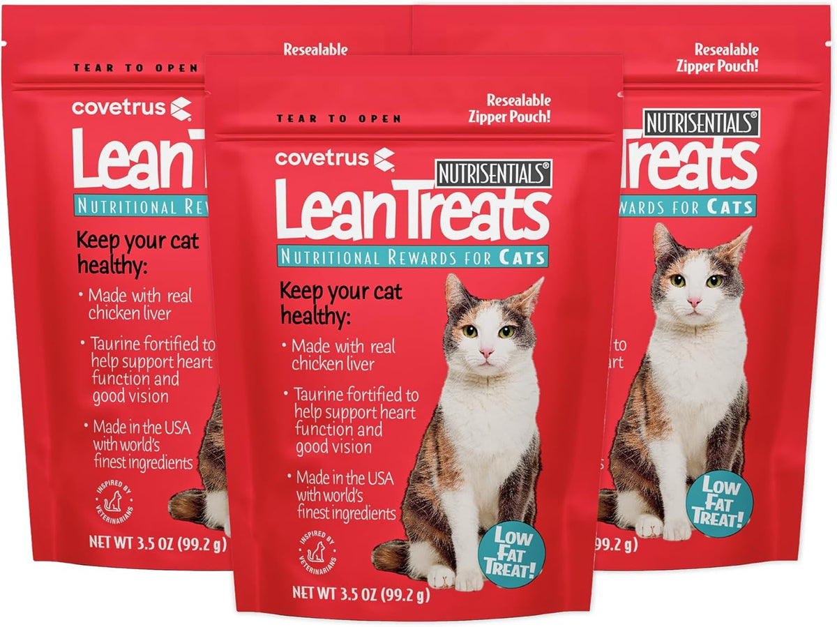 Adult cat enjoying Covetrus chicken flavored rewards