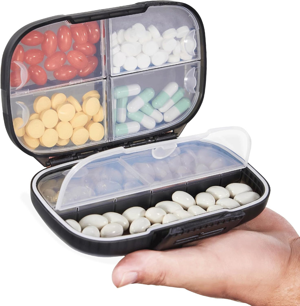 Sukuos Travel Pill Organizer front view showing the sleek black moisture proof outer shell
