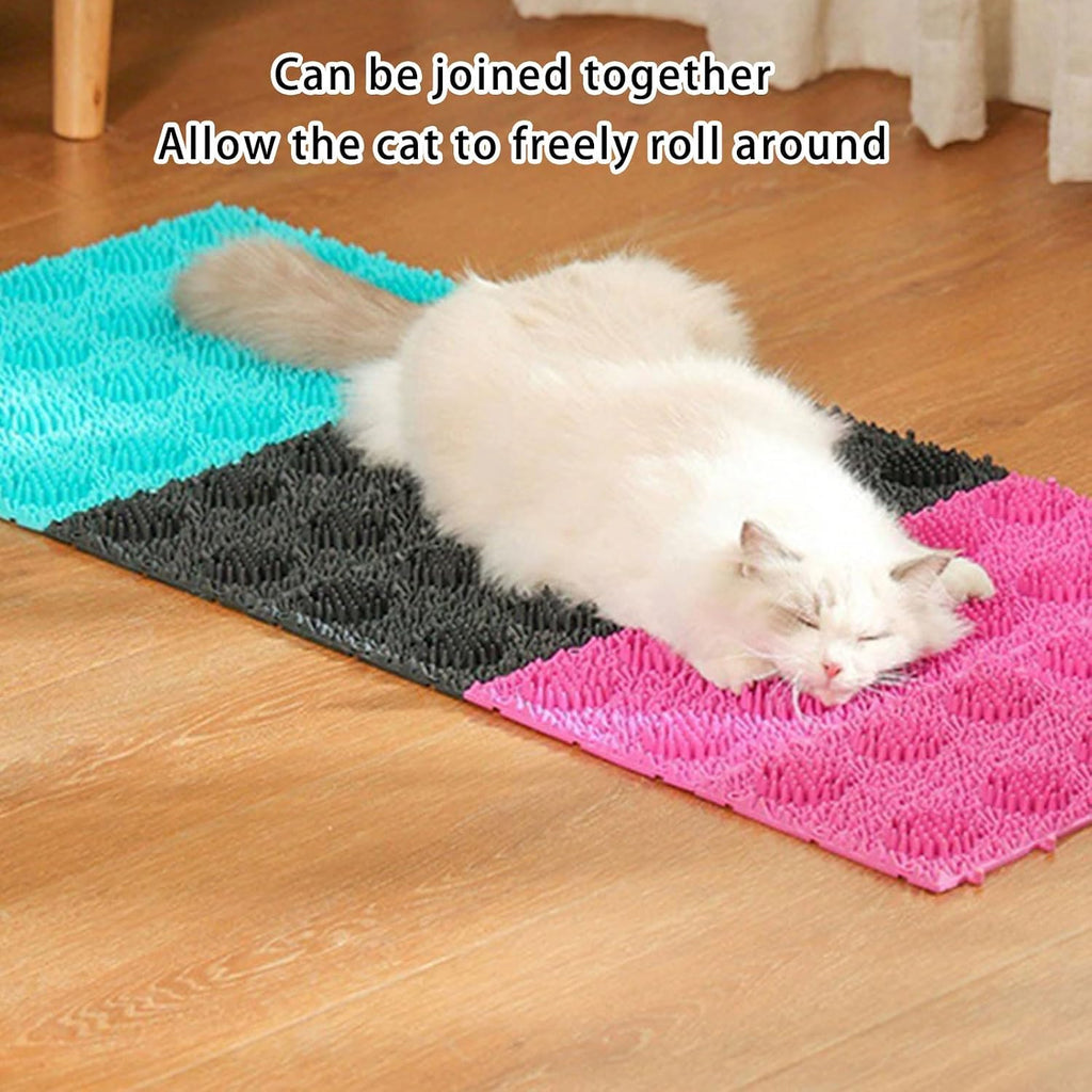 Cat using the ground massager for grooming and rubbing