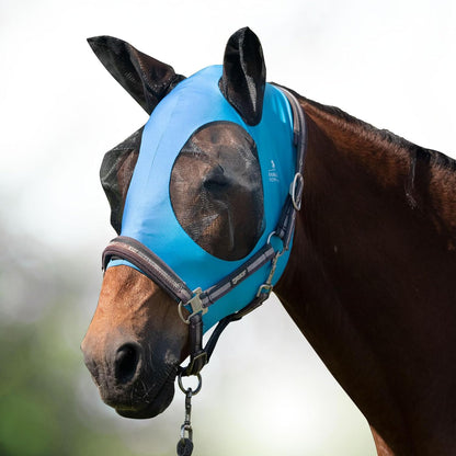 Rear view of horse wearing comfortable navy fly mask