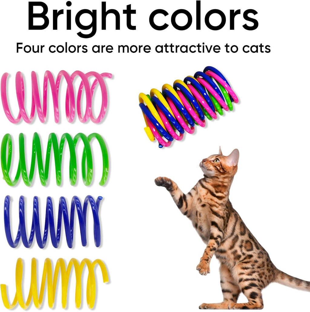 Indoor cat batting a bright pink plastic coil spring toy close up view
