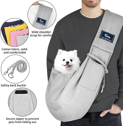 Reversible pet papoose bag showing plaid interior