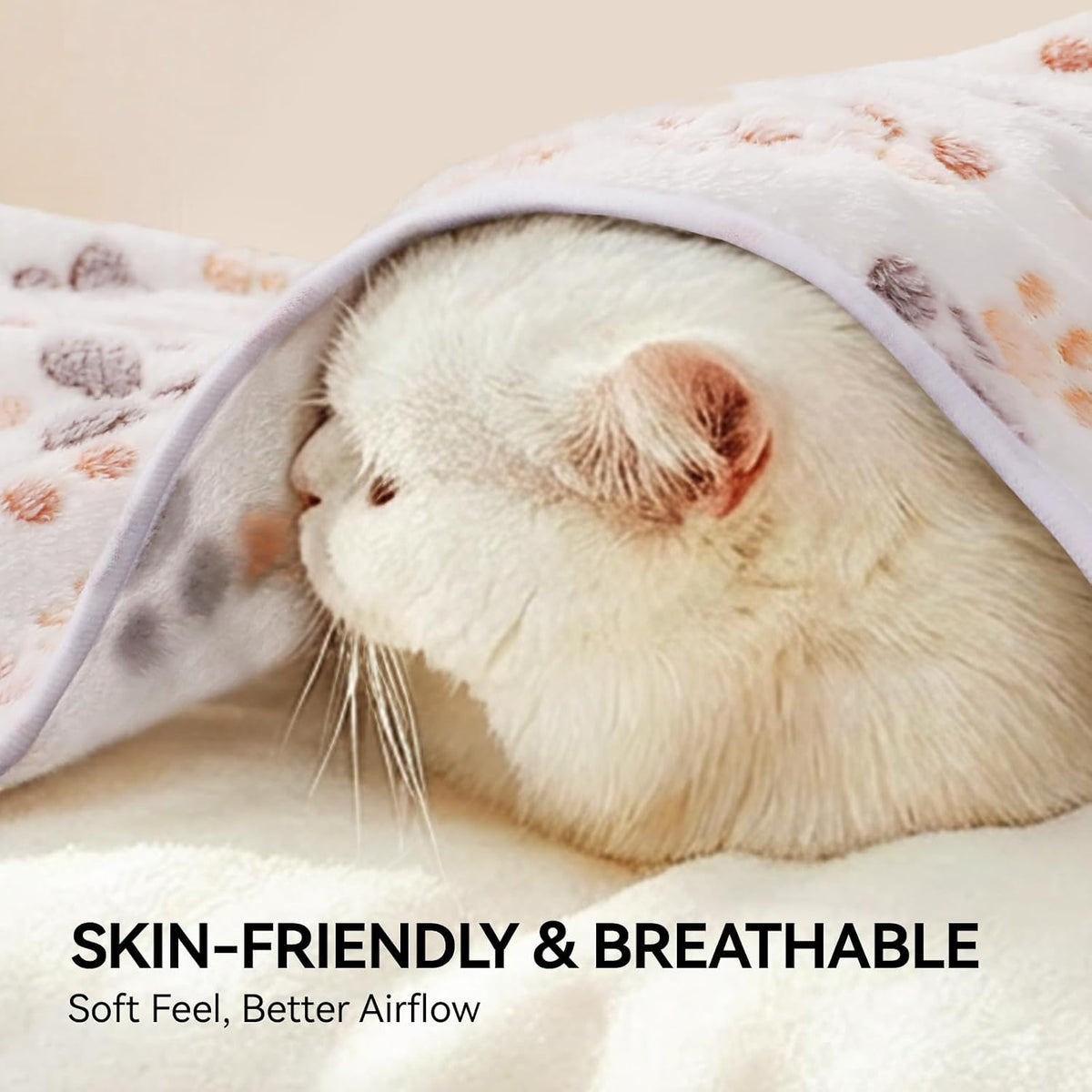 Small puppy resting comfortably on the LINENLUX paw print warm sleep blanket.