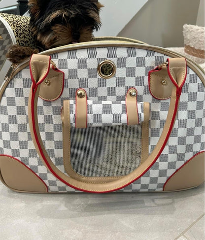 Side view of designer white and tan checkerboard pet carrier