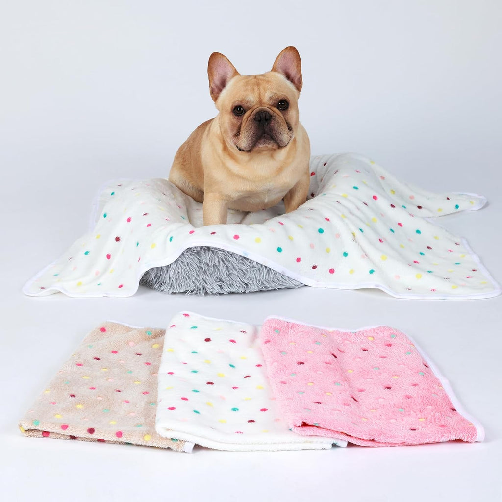 Three pack of Luciphia polka dot pet throws arranged neatly side by side