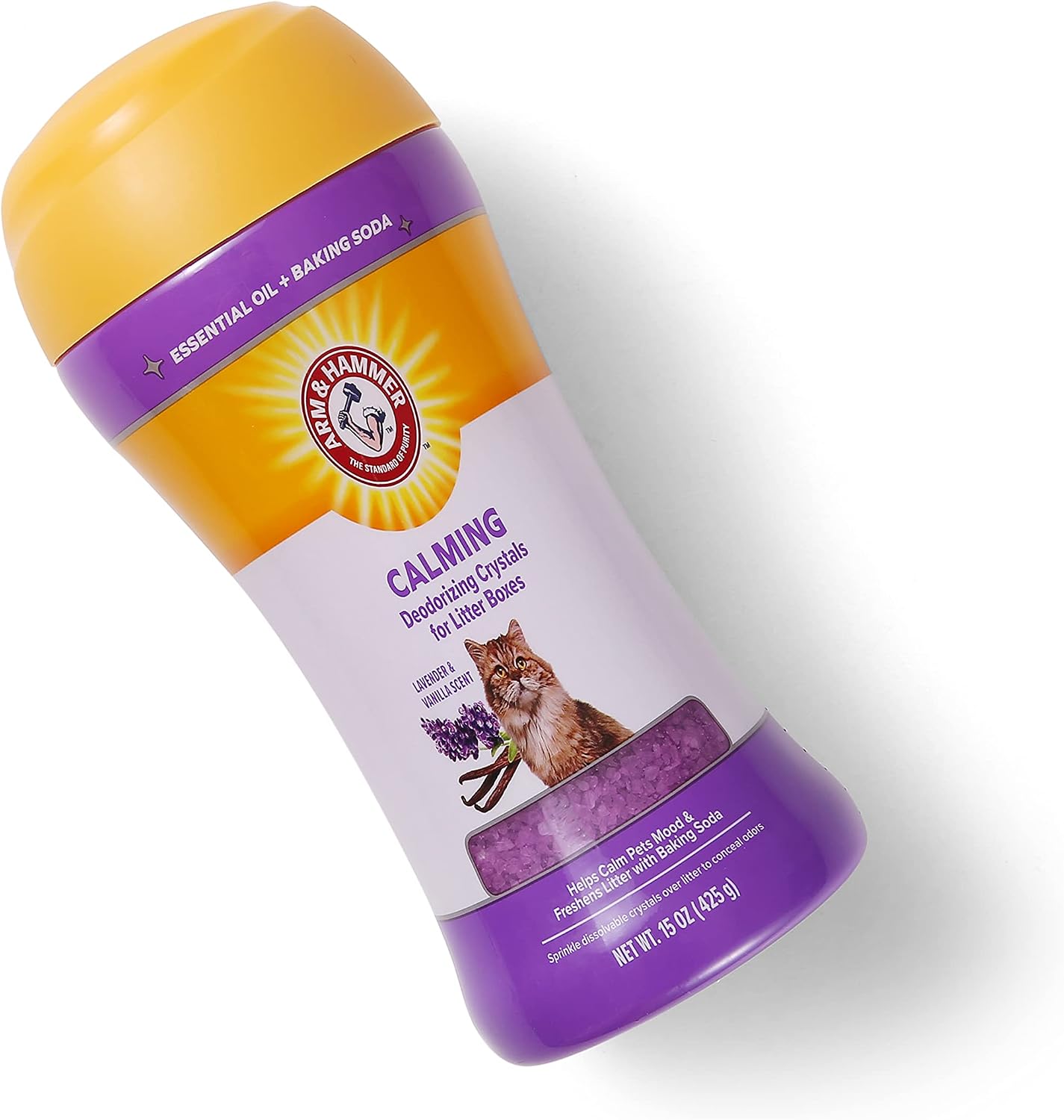 Sprinkling Arm and Hammer cat litter crystals over a clean litter box