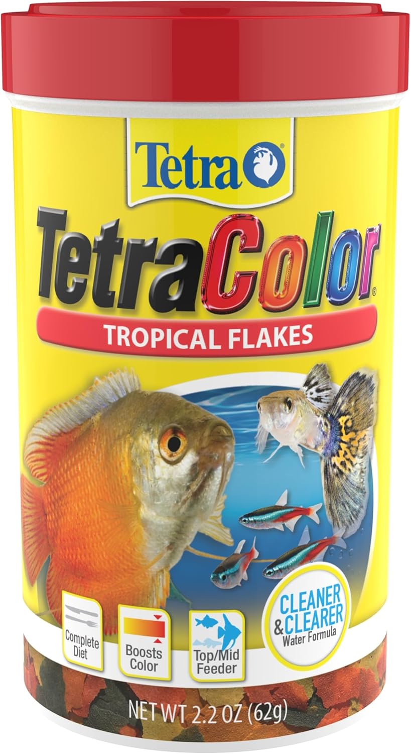 TetraColor fish food flakes in a glass bowl