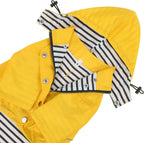 HDE double layer yellow puppy poncho demonstrating the adjustable drawstring fit around the neck.