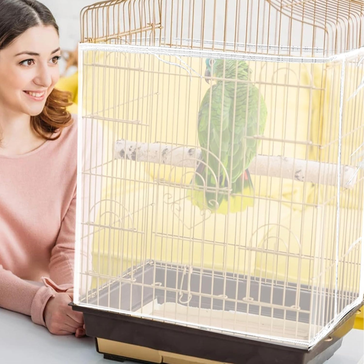 Bird cage seed catcher installed on square enclosure