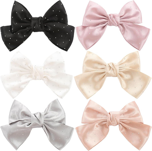 ONEYE large bow hair clips premium collection showcasing six different solid colors.