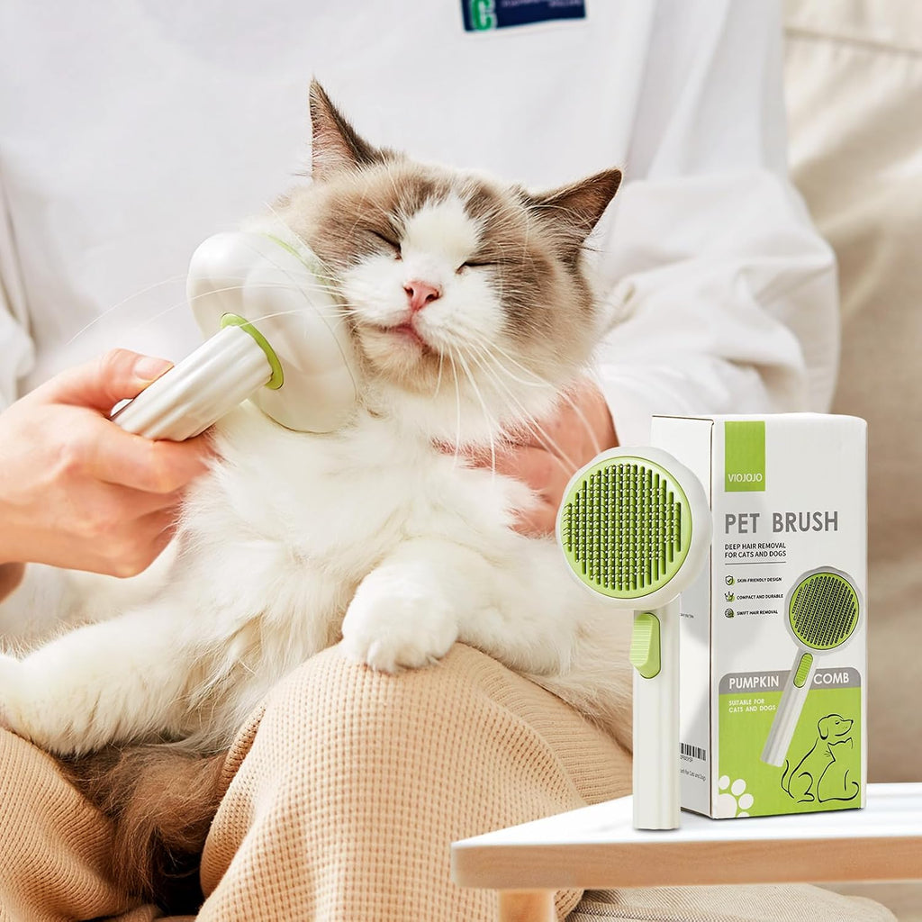 Back view of the VIOJOJO self cleaning pet brush highlighting the quick release push button.