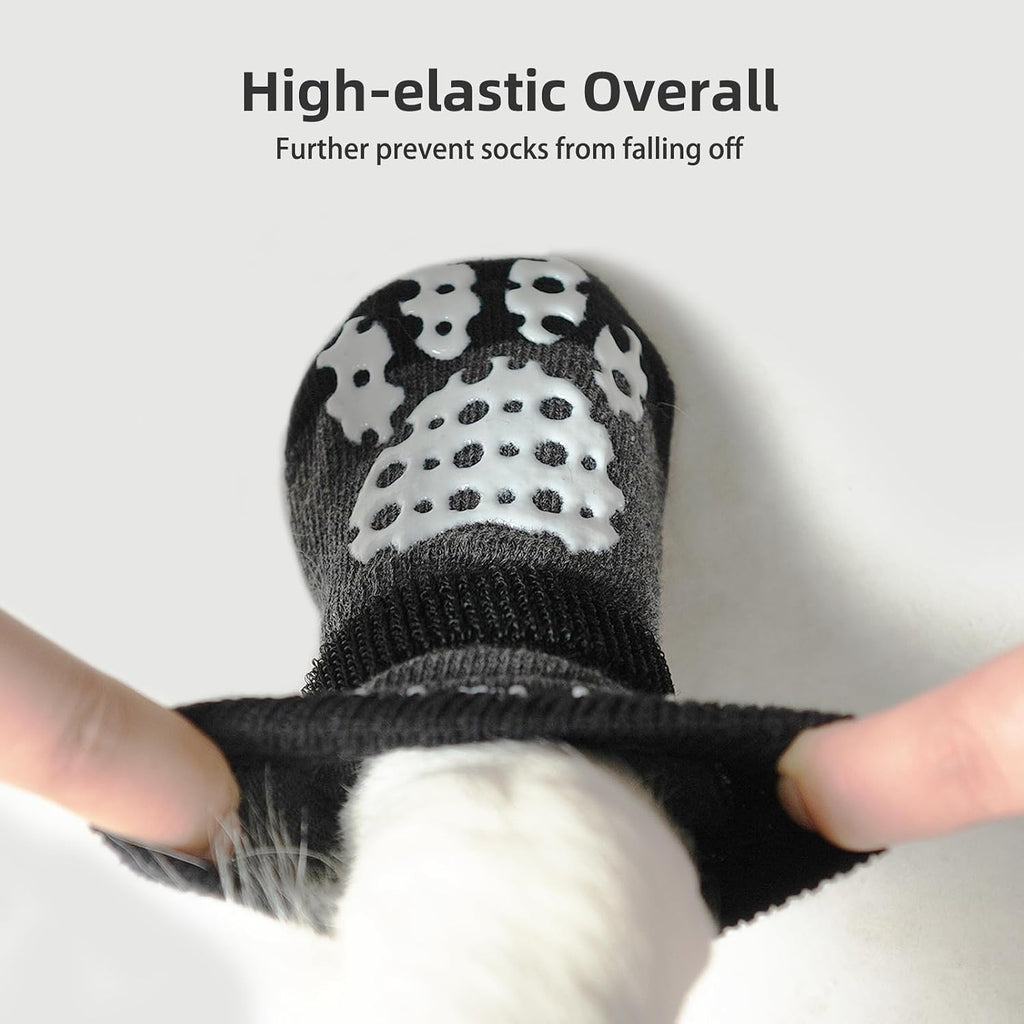 Dog wearing Pupteck anti-slip socks on hardwood floor