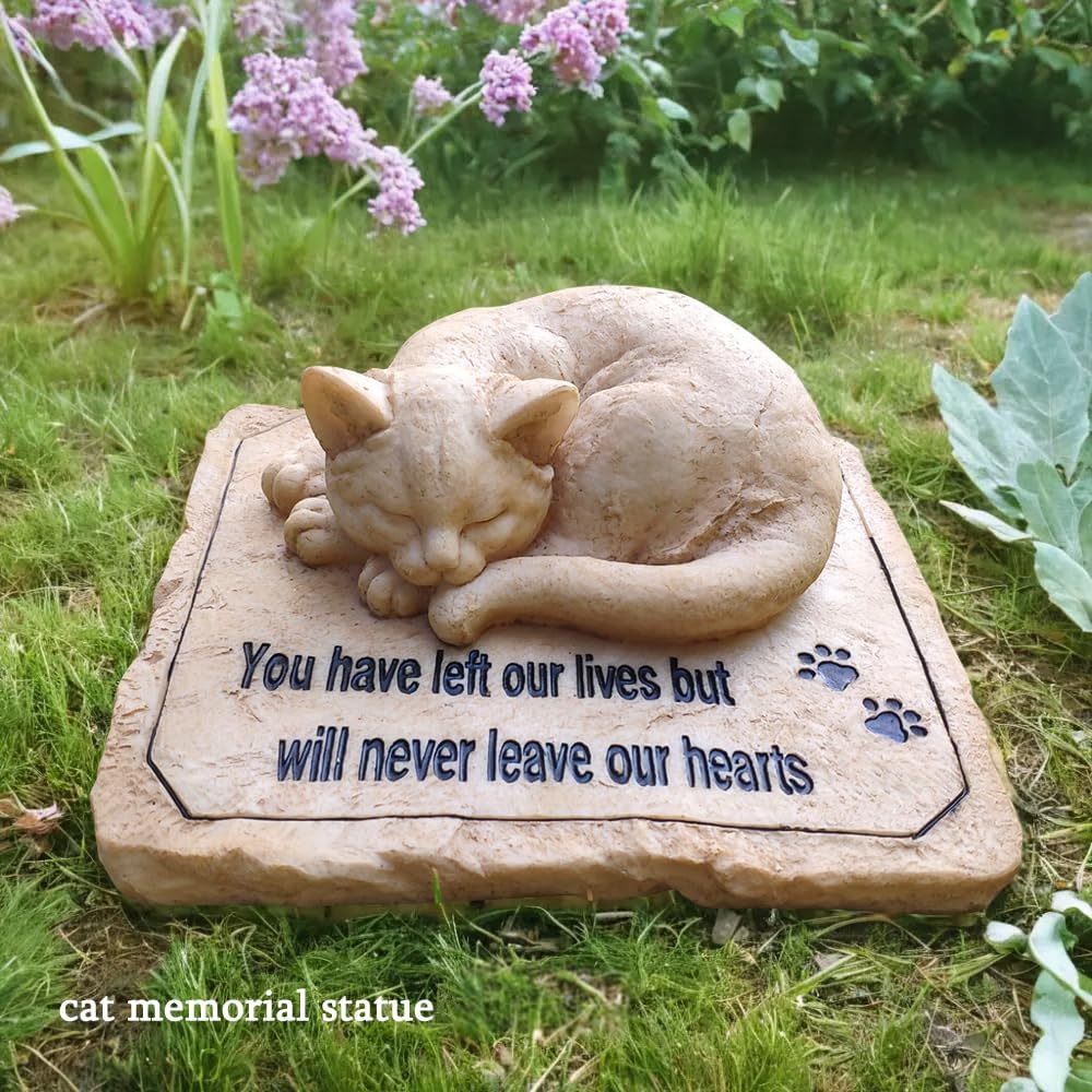 Close up shot of the paw prints and memorial inscription on the stone