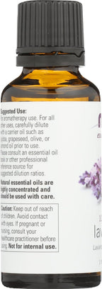A bottle of authentic imported NOW Foods lavender oil alongside a bottle of sweet almond carrier oil