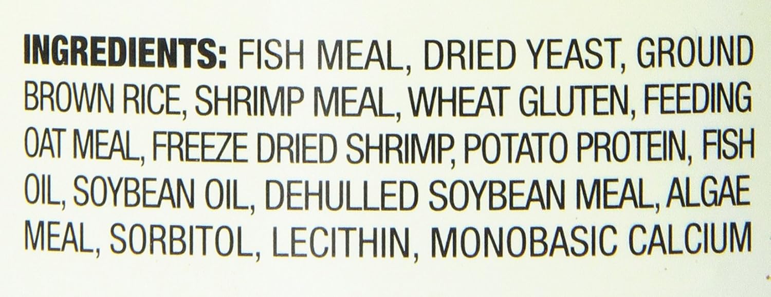 Authentic imported USA formula Tetra fish food packaging details.