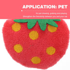 Close up of Toddmomy plush pet chew toy showing yellow dot embroidery and green leaf detail.