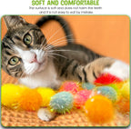 Soft textured glitter tinsel balls for kittens showing safe polypropylene material close up.