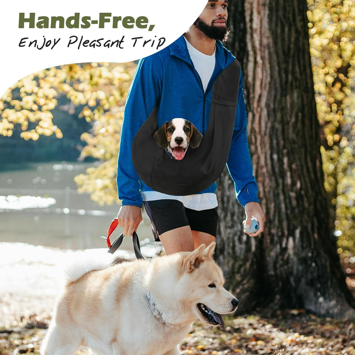 Small dog sitting inside Pawaboo black sling carrier