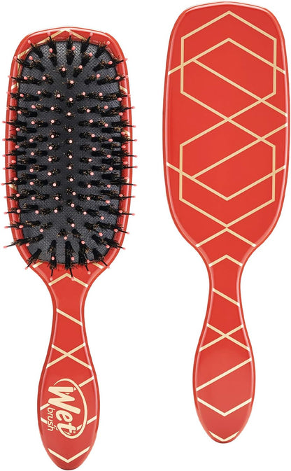 Wet Brush teal pet grooming tool displayed to show the flexible bristle arrangement.