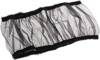 White airy gauze bird cage skirt accessory demonstrating stretchability and light penetration