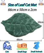 Green leaf pet pad on living room sofa with quilted stitching