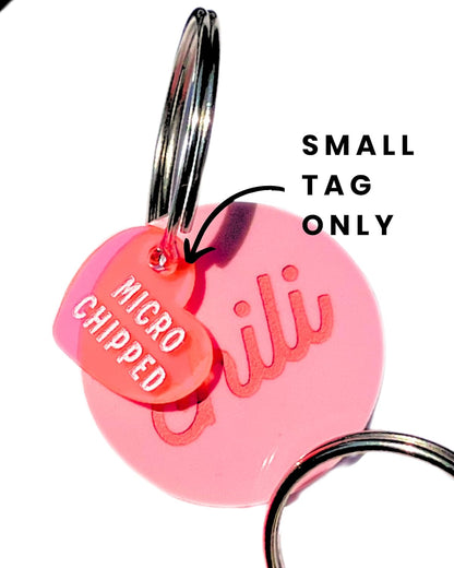 Haven Print Co. microchip identification pet safety engraved charm with split ring.