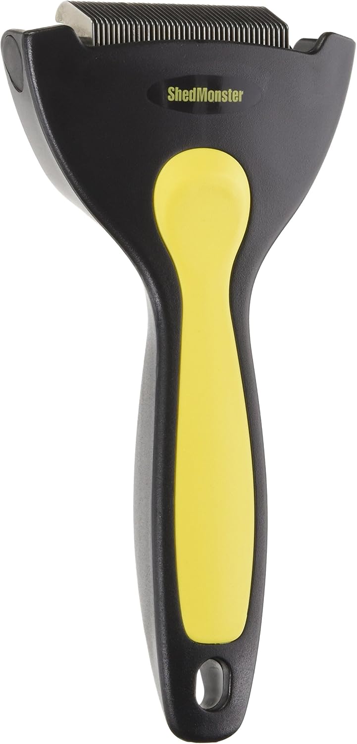 Kerbl Oster ShedMonster yellow brush showing stainless steel teeth