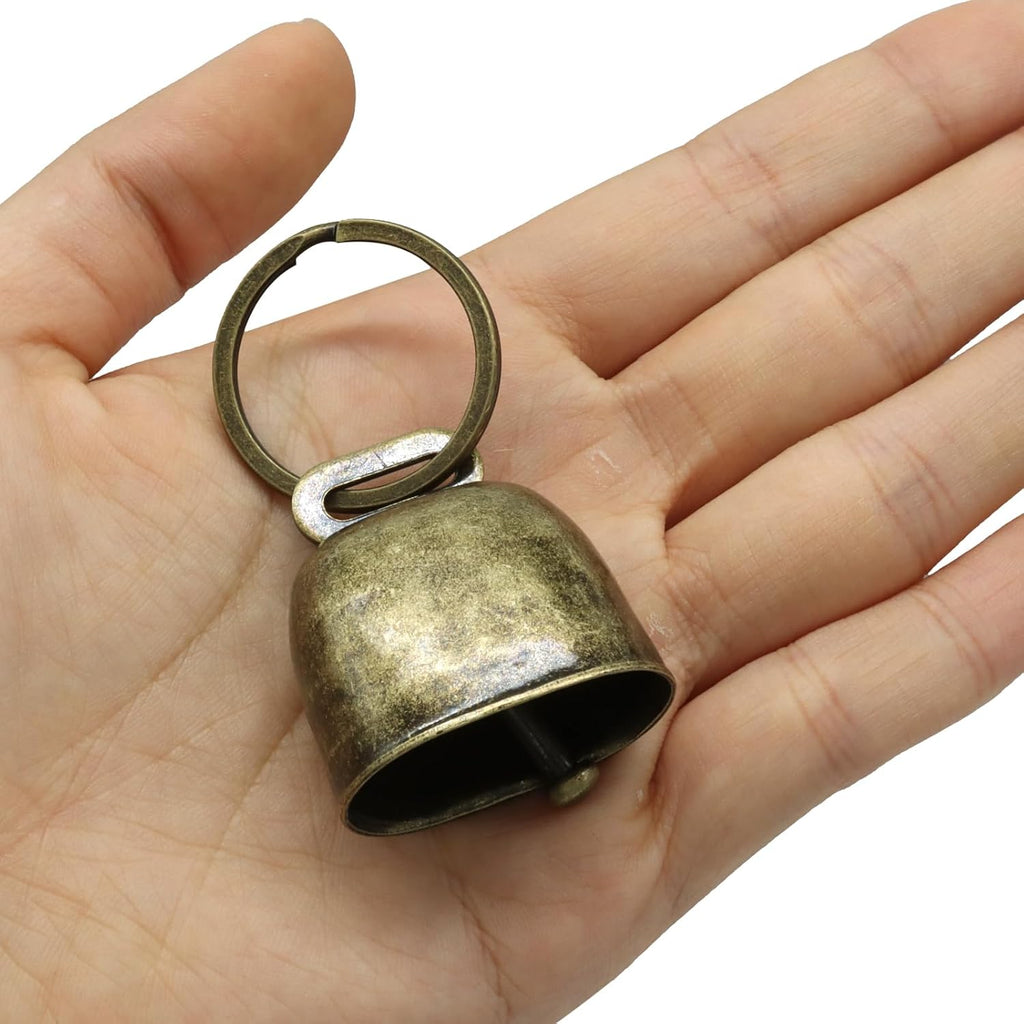 Detailed texture of the rust-resistant brass finish on pet bells.