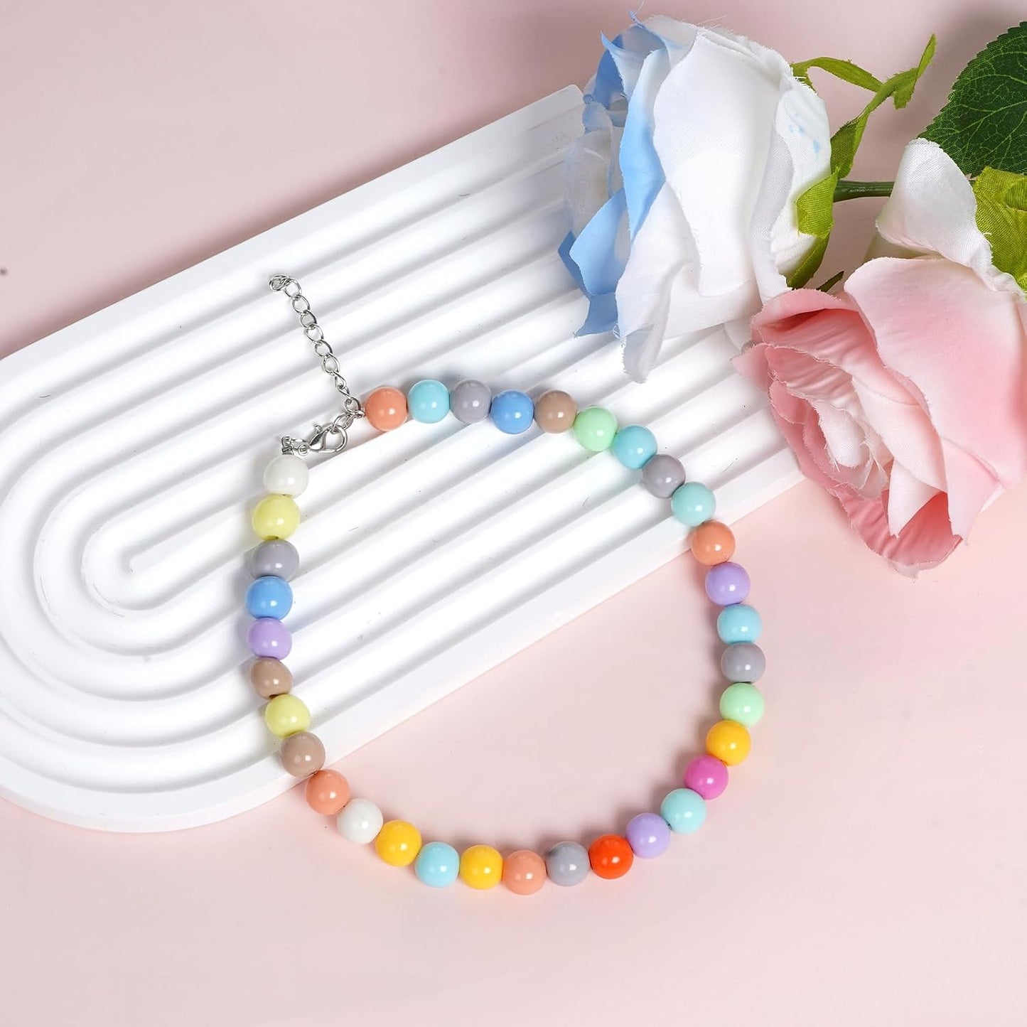 Fengek 9.5-millimeter lightweight smooth pet beads close-up highlighting glossy texture.