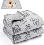 Fluffy cat sleeping peacefully on the ultra soft Okxiri grey bone pattern blanket