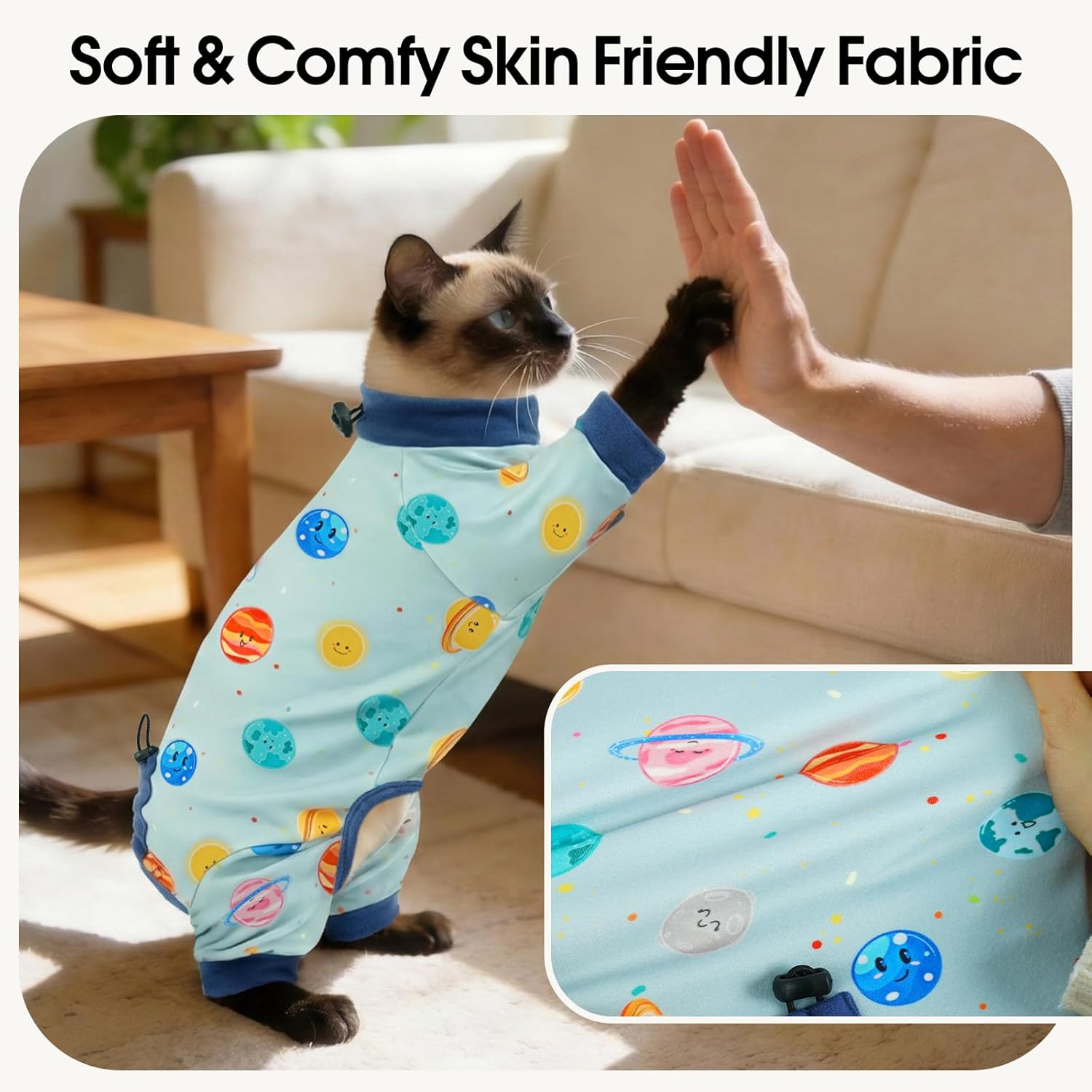 Cat resting comfortably in blue Dentrun recovery suit