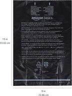 Amazon Basics dog waste bags attached to a pet lead using the secure plastic leash clip.