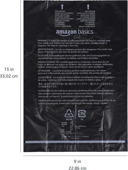 Amazon Basics dog waste bags attached to a pet lead using the secure plastic leash clip.