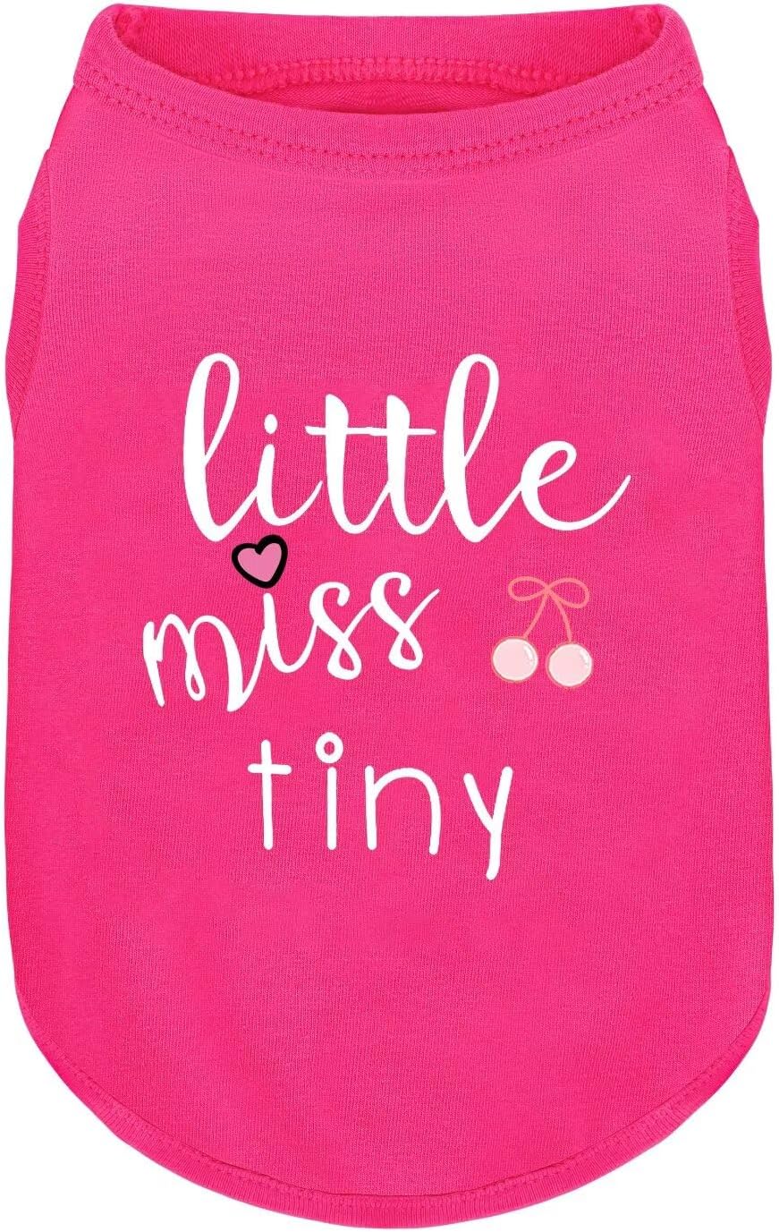 Folded pink cotton dog shirt showing texture and quality