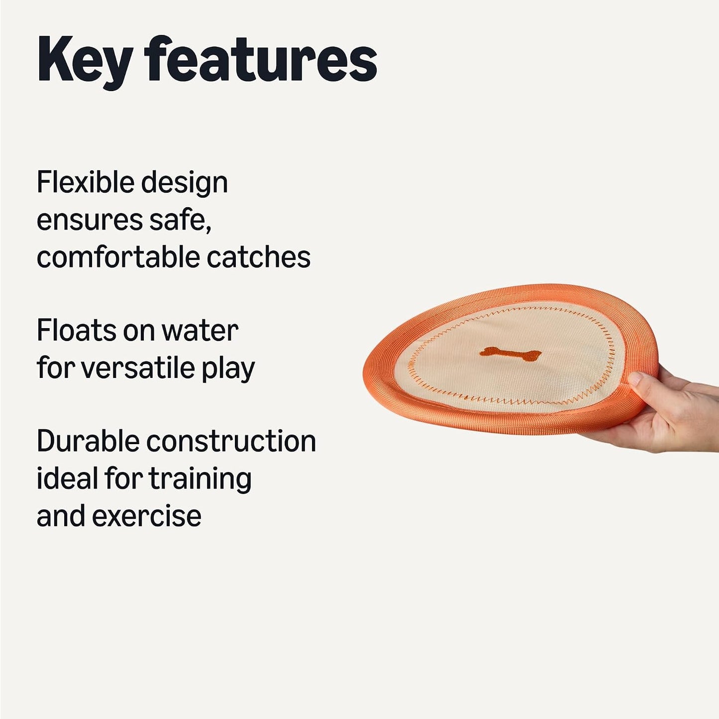 Beige and orange flexible dog frisbee in motion