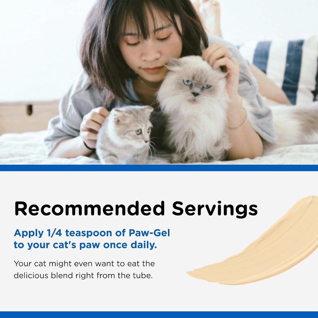 Cat licking daily vitamin paw gel from paw