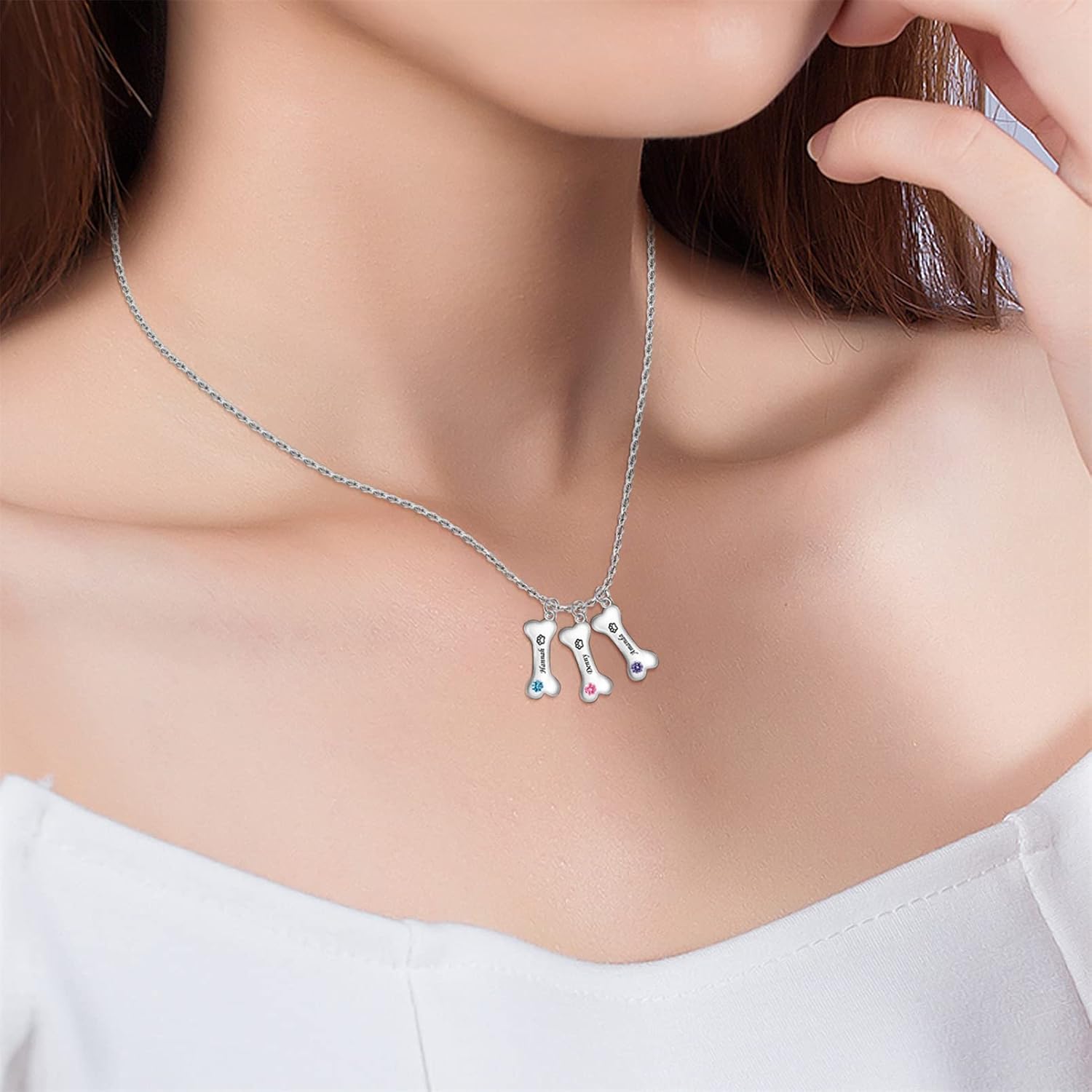 Three distinct finishes of the YUYOO custom bone necklace including classic silver, yellow gold, and rose gold.