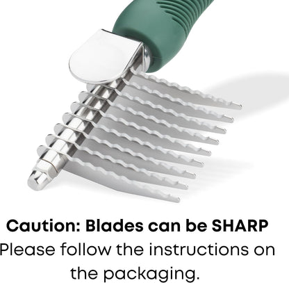 Ergonomic green pet grooming rake for removing stubborn knots at home